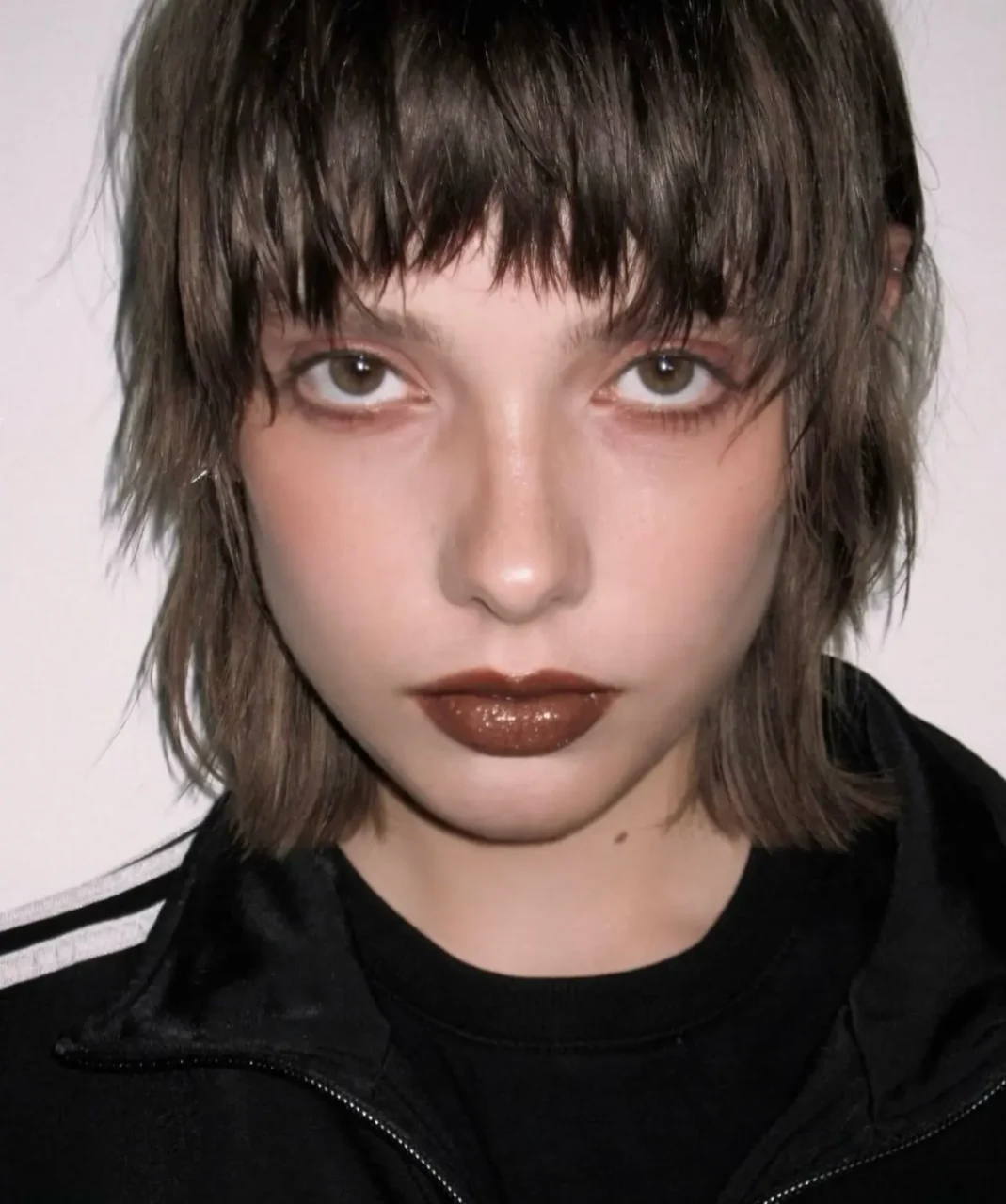 grunge haircut with heavy layers and sharp fringe by Tanya at ESHK Neukölln hair salon Berlin